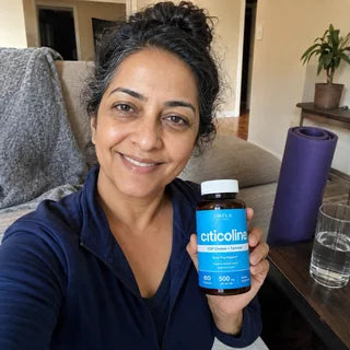 Customer holding Orela Clear Focus Citicoline at home