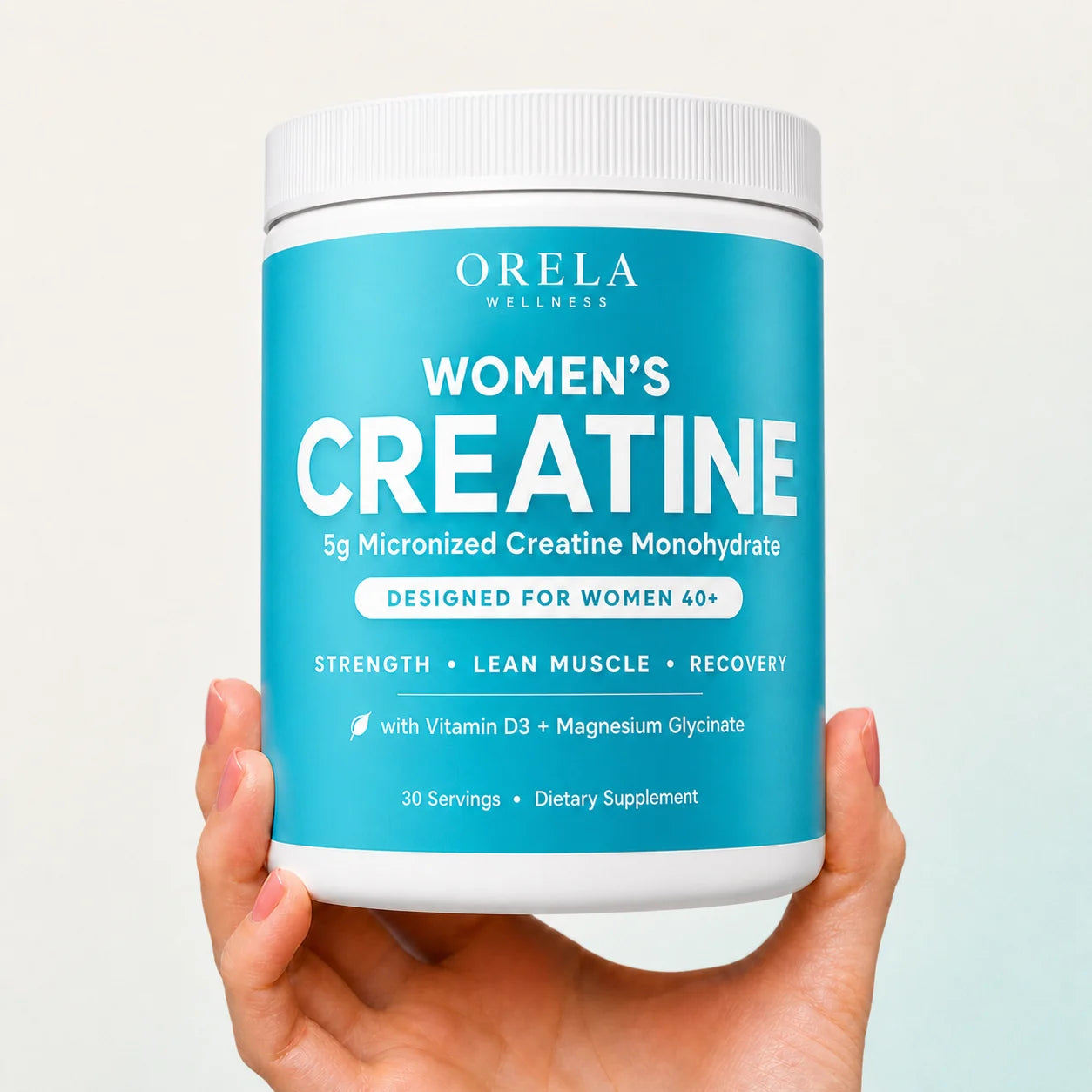 Orela Women's Creatine jar held in hands