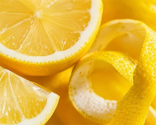 Fresh lemon slices and peel