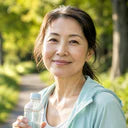 Woman taking a break on a sunny morning walk