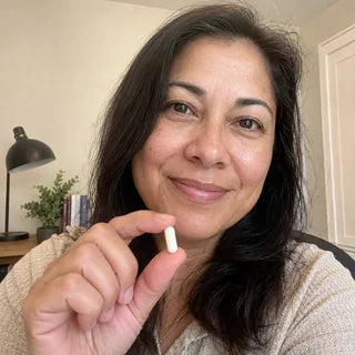 Customer holding a Clear Focus Citicoline capsule